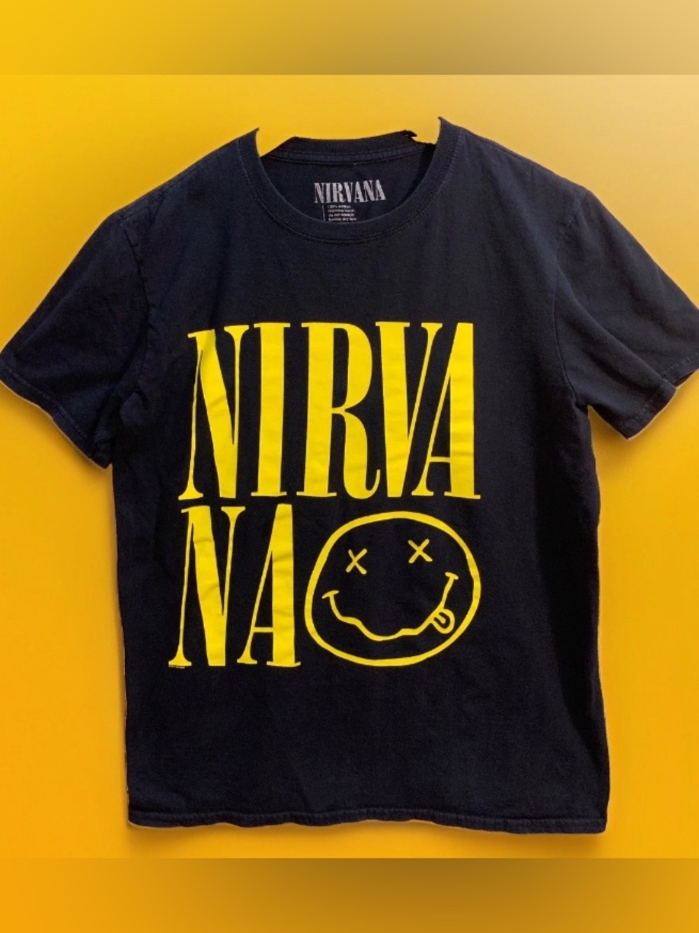 NIRVANA Iconic Smiley Face Grunge Black Tee with Bold Yellow Graphic Size M